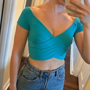 Gorgeous aqua blue Bebe wrap crop top